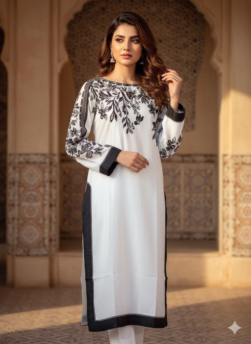 The ensemble is a chic, printed three-piece suit (fabric silk )