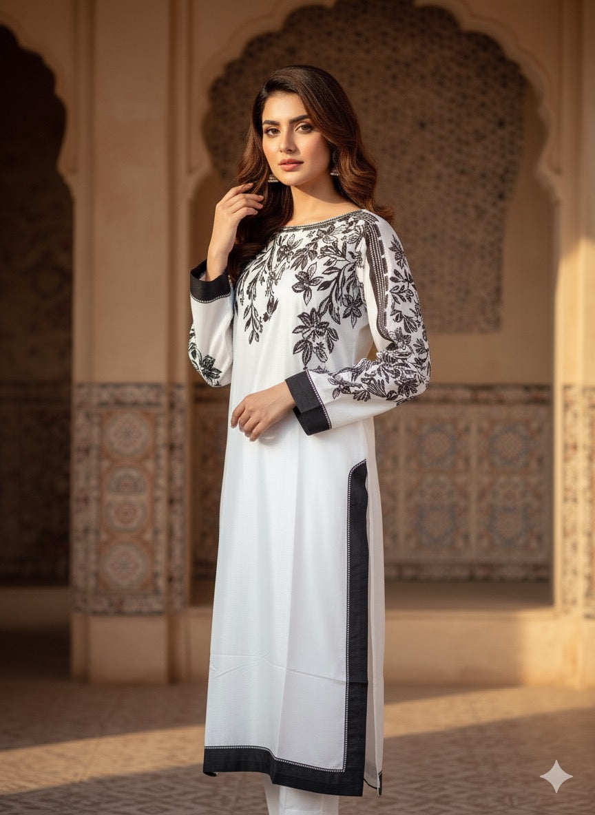 The ensemble is a chic, printed three-piece suit (fabric silk )
